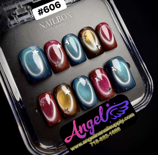 Set of multicolored nail samples in a display case with 'Nailbox' branding.