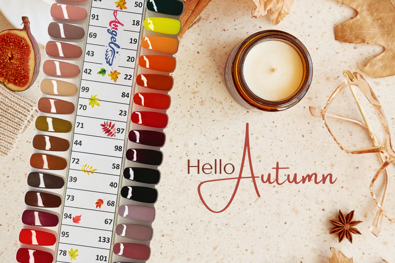 Color swatch with 'Hello Autumn' text, candle, and fall leaves on a textured surface
